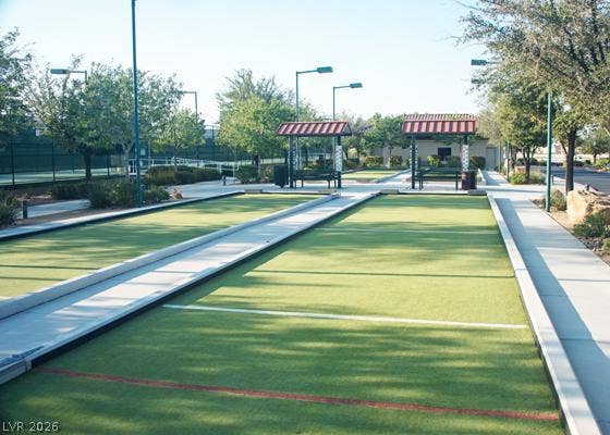 7940 Fantail Drive, North Las Vegas, NV 89084 Impeccably maintained outdoor recreation courts lie adjacent to paved walking paths and shaded seating areas.