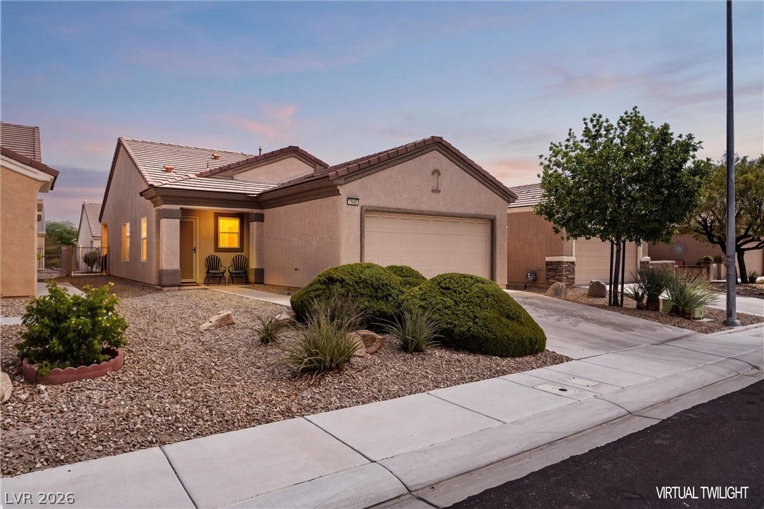 7940 Fantail Drive, North Las Vegas, NV 89084 Low-maintenance desert landscaping and a paved driveway lead to this single-story stucco home.