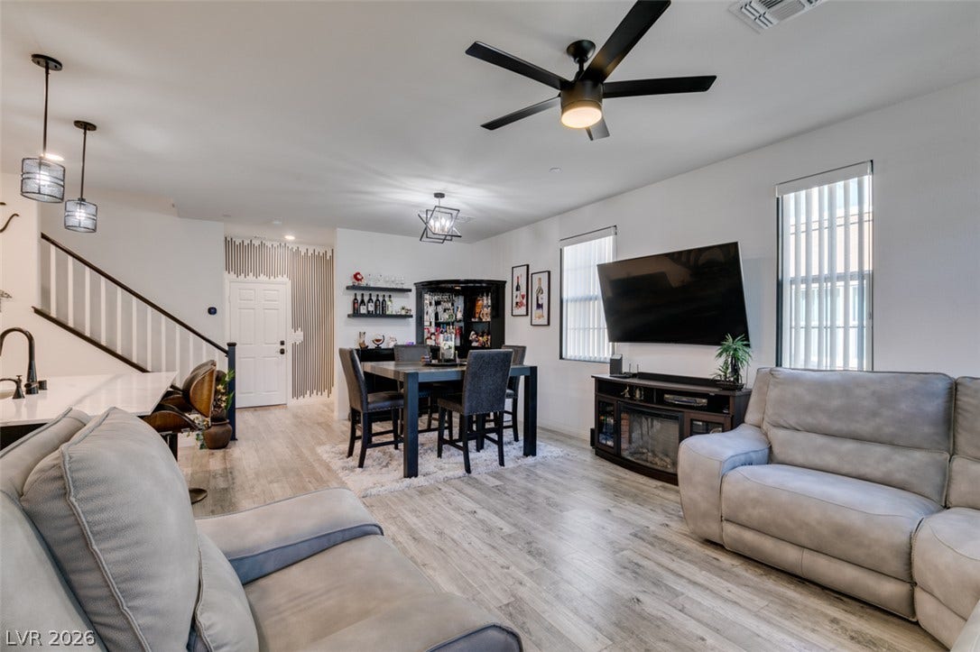 3231 Pergusa Drive, Henderson, NV 89044 Clean lines and light flooring define this open concept main level with tall windows.