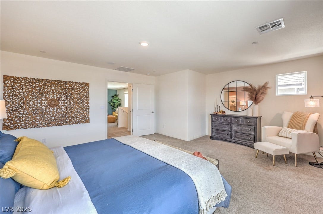 1036 PEACOCK PLUME Street, Henderson, NV 89011 Photo is representational only; actual home finishes may vary. View of carpeted bedroom