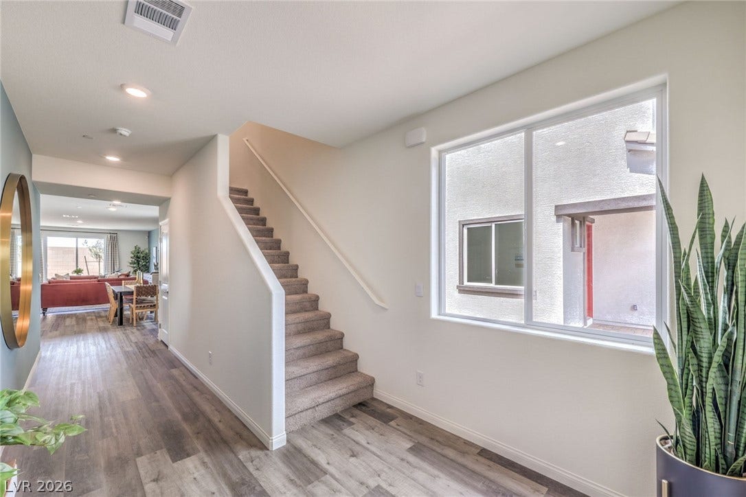 1036 PEACOCK PLUME Street, Henderson, NV 89011 Stairs with wood finished floors, baseboards, and recessed lighting