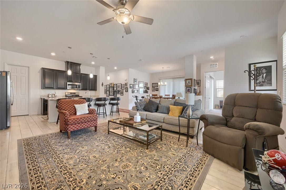 747 Orange Plume Walk, Henderson, NV 89011 An open-concept living area integrates smoothly with the nearby kitchen.