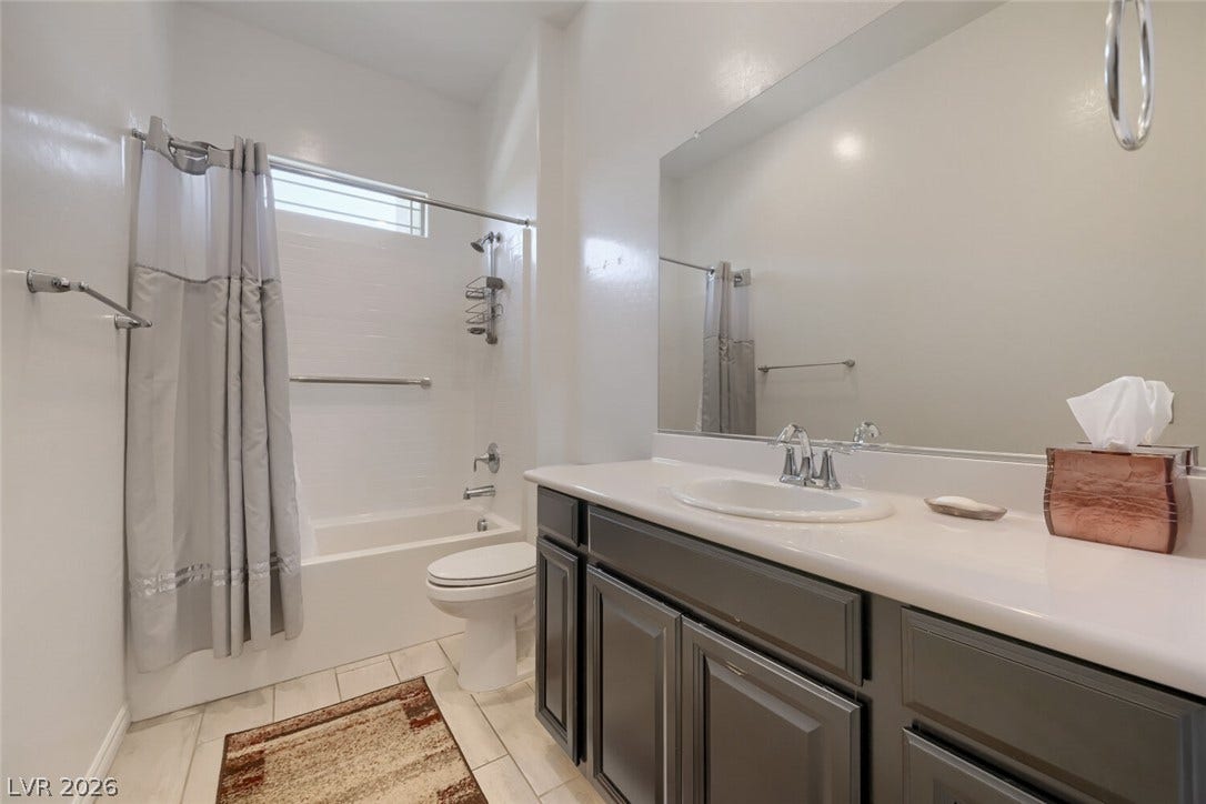 747 Orange Plume Walk, Henderson, NV 89011 Clean lines and a dark vanity define this functional bathroom spaces.