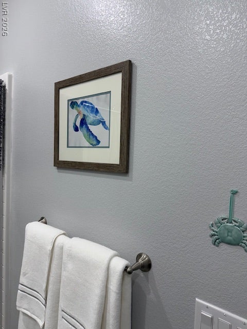 384 Aravalli Crest Street, Henderson, NV 89015 Artistic accents and fresh towels elevate everyday living spaces.