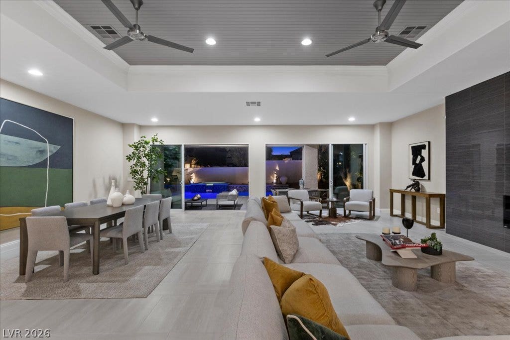 9425 Garnet Crown Avenue, Las Vegas, NV 89145 An open floorplan integrates the living and dining spaces under a distinctive inset ceiling.