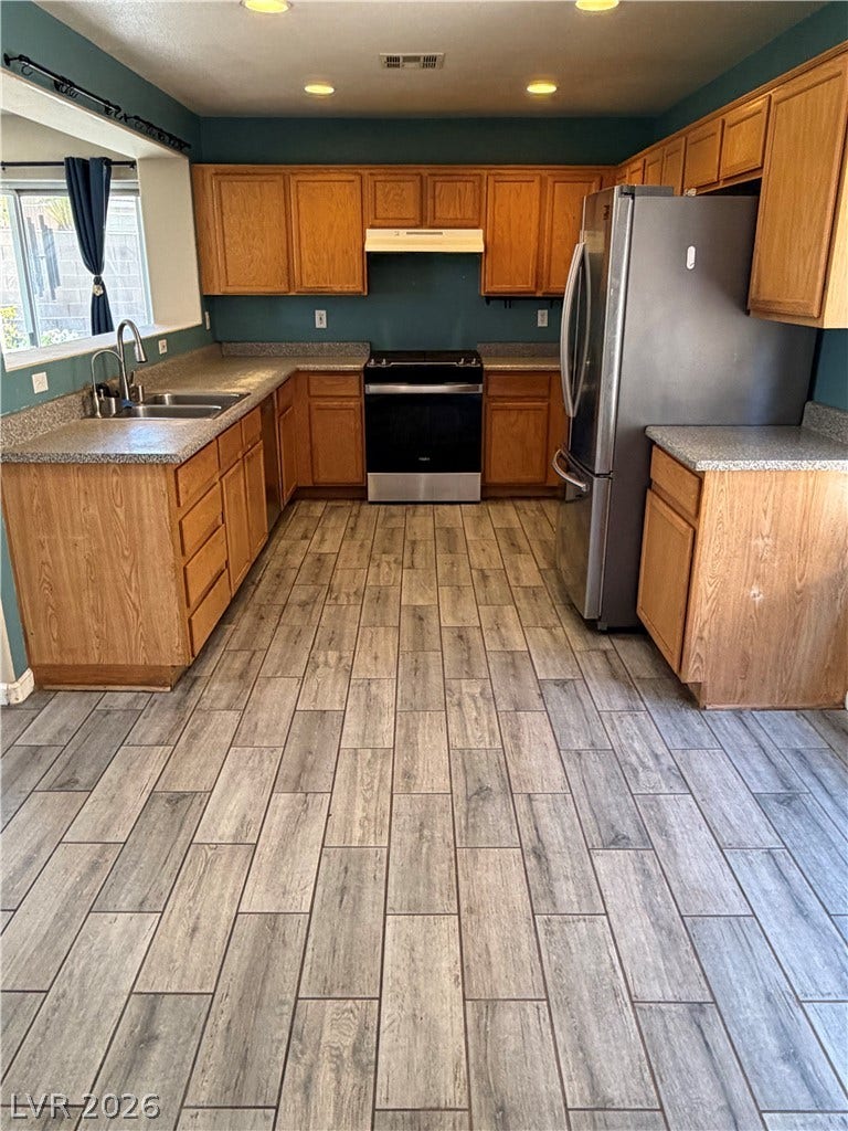 Functional kitchen with ample cabinetry and a practical layout.
