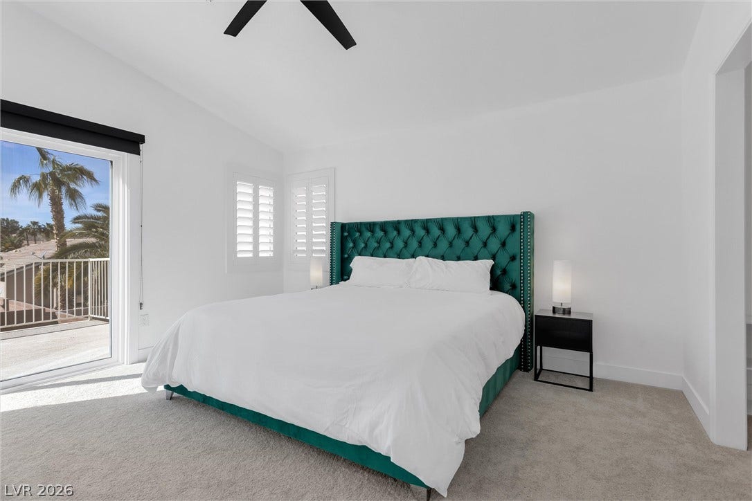 337 Teal Ridge Hills Drive, Henderson, NV 89014 Sliding glass doors open directly to a private balcony in this comfortable retreat.