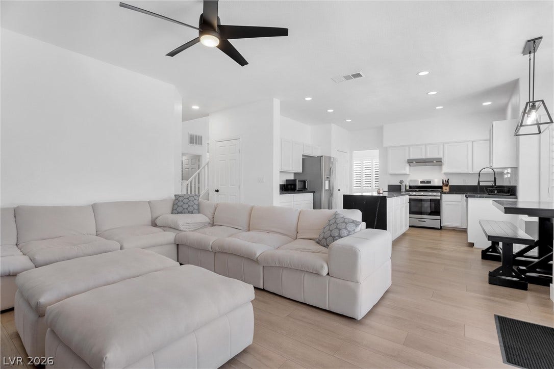 337 Teal Ridge Hills Drive, Henderson, NV 89014 Clean lines and smooth wood floors define this open living and dining layout.