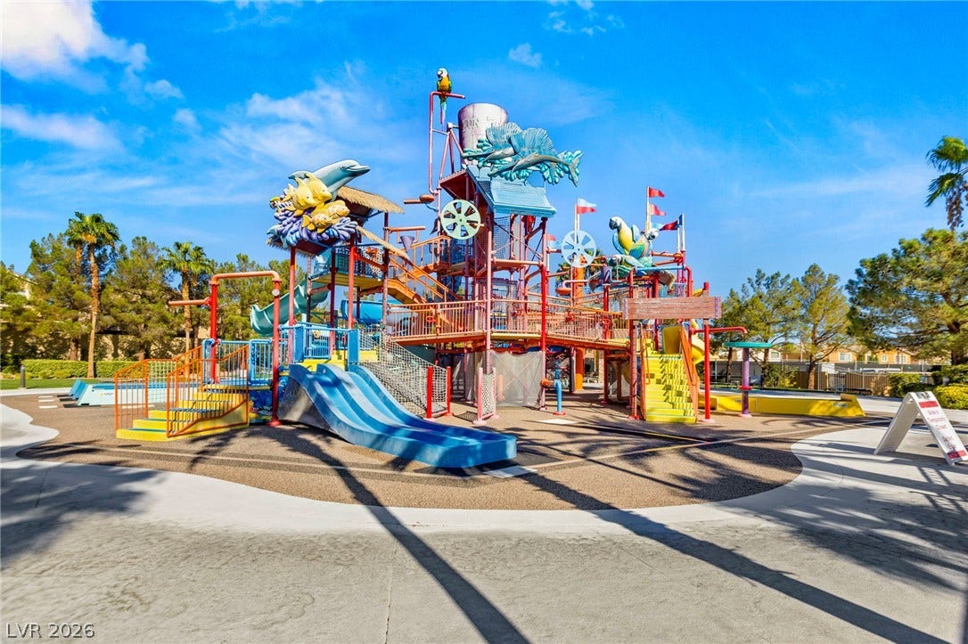 Residents enjoy access to a resort-style community water park / fun zone with slides and interactive play structures for kids and adults to enjoy.