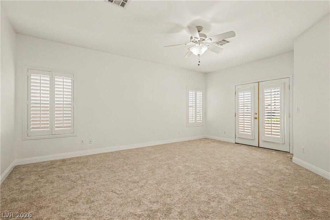 1424 Clipperton Avenue, Henderson, NV 89074 Plush carpeting and classic plantation shutters define this versatile living space.
