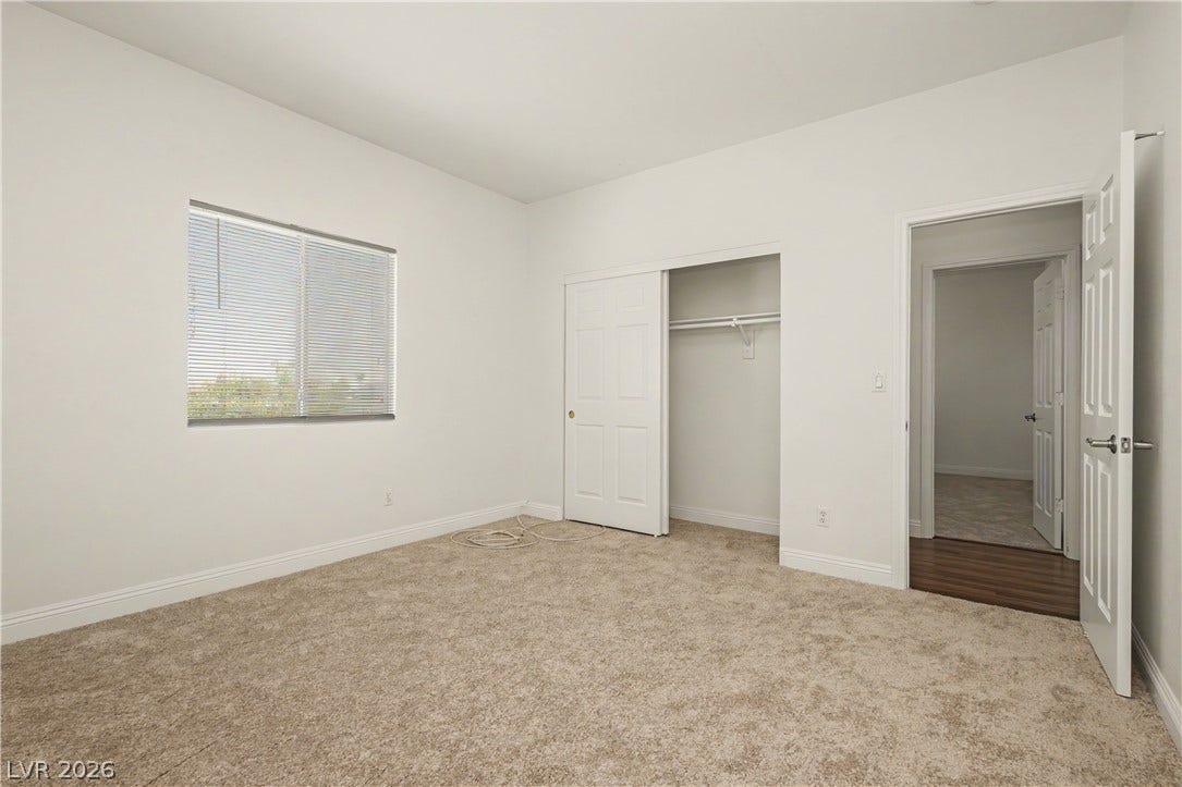 1424 Clipperton Avenue, Henderson, NV 89074 Neutral walls and soft carpeting create a clean foundation in this comfortable bedroom.