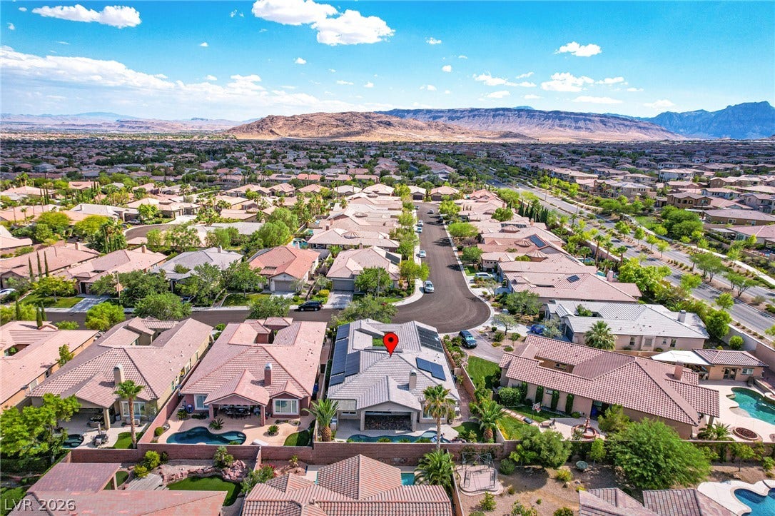 Dramatic mountain vistas frame this peaceful neighborhood of fine homes.
