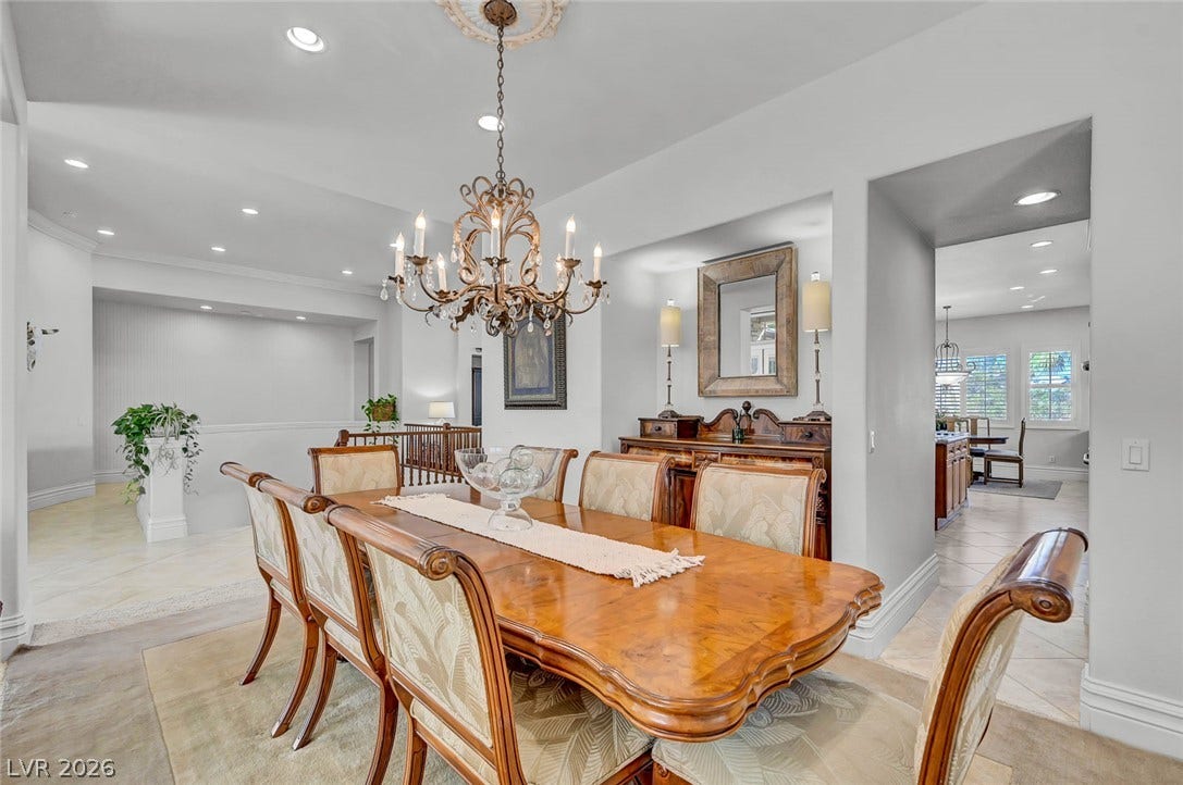 1116 Golden Age Court, Las Vegas, NV 89144 An elegant dining space showcases refined crown molding.