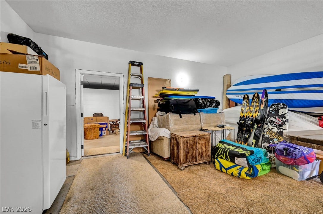 1116 Golden Age Court, Las Vegas, NV 89144 An interior doorway connects this versatile storage room directly to the basement level.