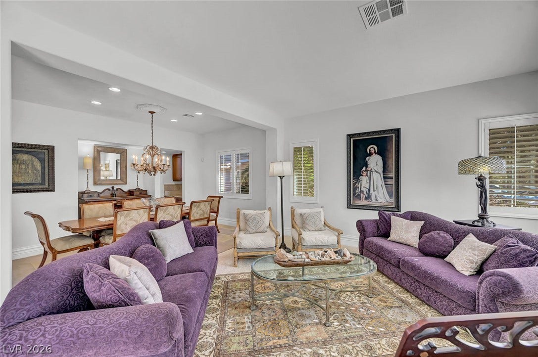 1116 Golden Age Court, Las Vegas, NV 89144 An open floor plan seamlessly connects the comfortable living space with an elegant dining area.