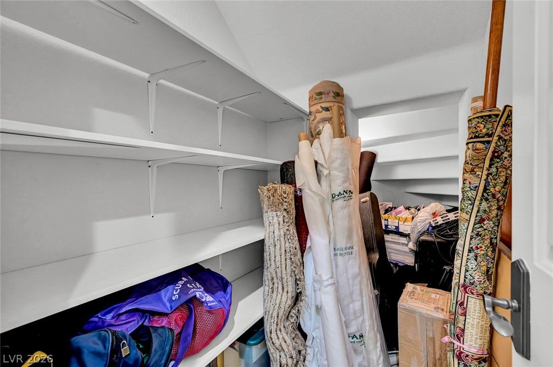 1116 Golden Age Court, Las Vegas, NV 89144 Ample built-in shelving maximizes the storage potential of this versatile closet space.