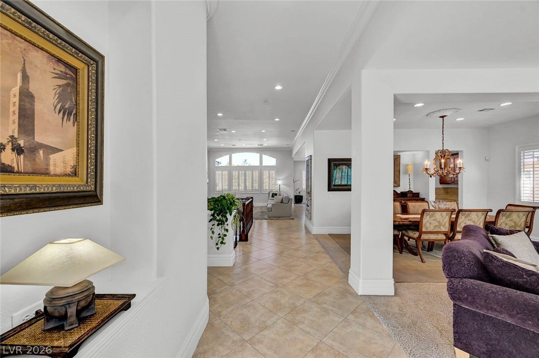 1116 Golden Age Court, Las Vegas, NV 89144 An open floorplan showcases classic crown molding and beautiful flooring throughout the main level.