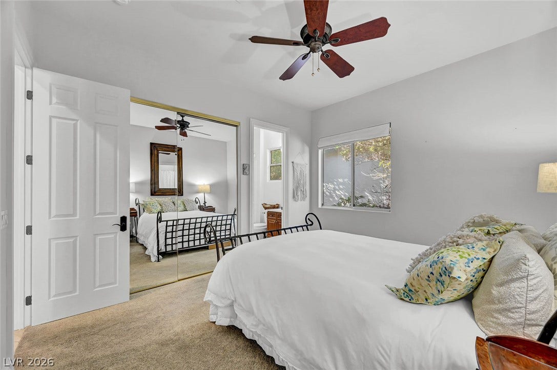 1116 Golden Age Court, Las Vegas, NV 89144 Soft carpet and mirrored closet doors enhance this cozy bedroom retreat.