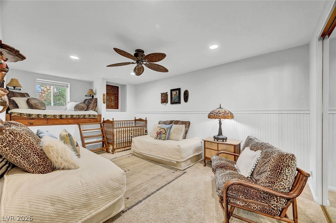 1116 Golden Age Court, Las Vegas, NV 89144 Recessed lighting and soft carpeting create a cozy atmosphere in this versatile lower level room.