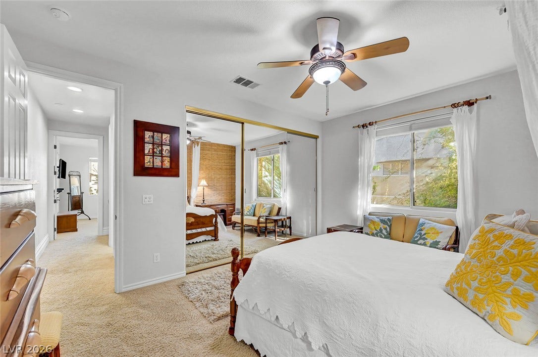 1116 Golden Age Court, Las Vegas, NV 89144 Plush carpeting and mirrored closet doors enhance this cozy retreat with natural light.