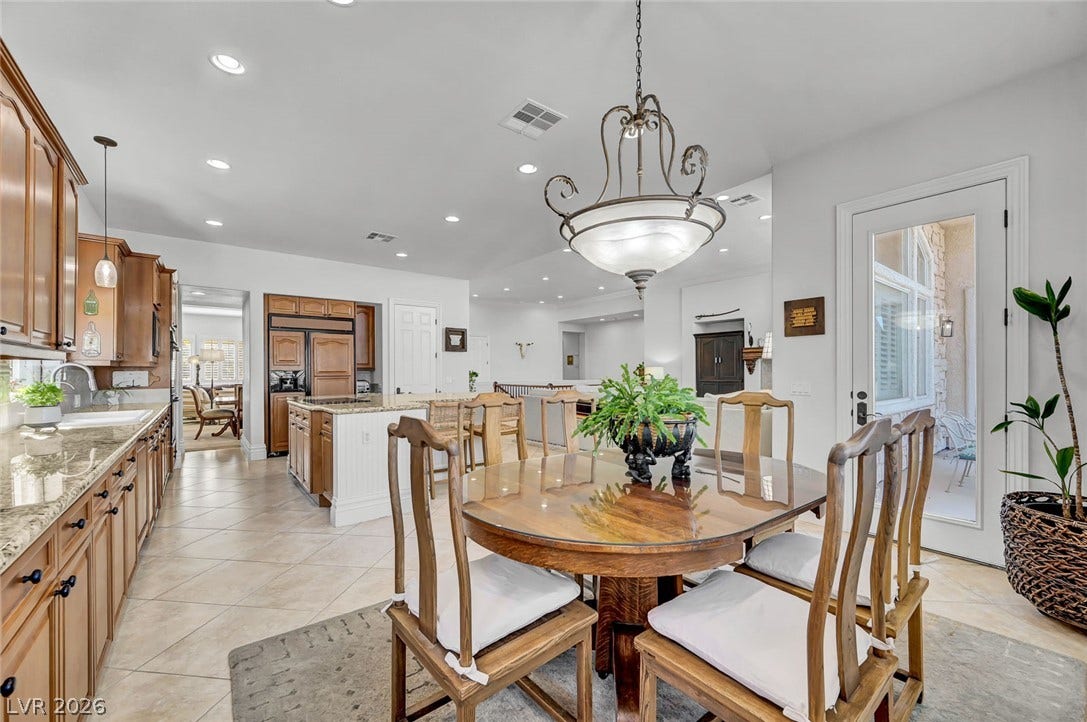 1116 Golden Age Court, Las Vegas, NV 89144 Open layout seamlessly connect the kitchen and dining areas.