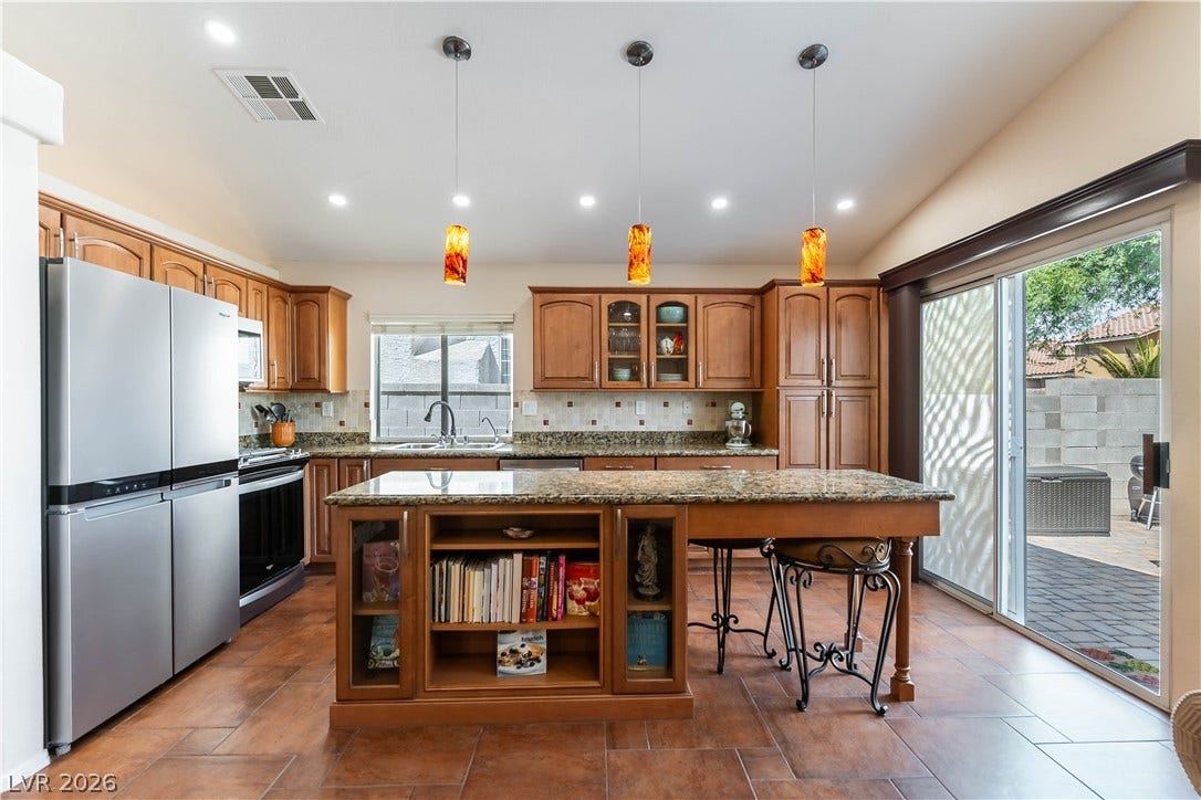 2408 Pebble Springs Court, Henderson, NV 89074 Recessed lighting in Kitchen with dimmers