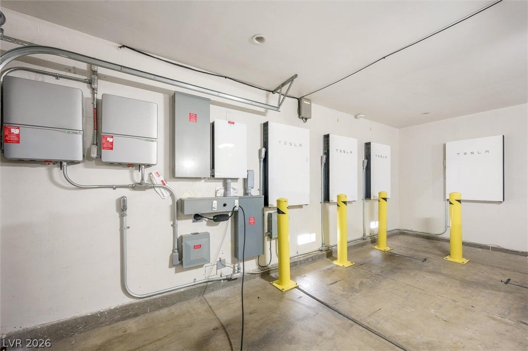 1584 Bozeman Drive, Henderson, NV 89012 Concrete floors and a smooth plaster ceiling define this functional utility space.