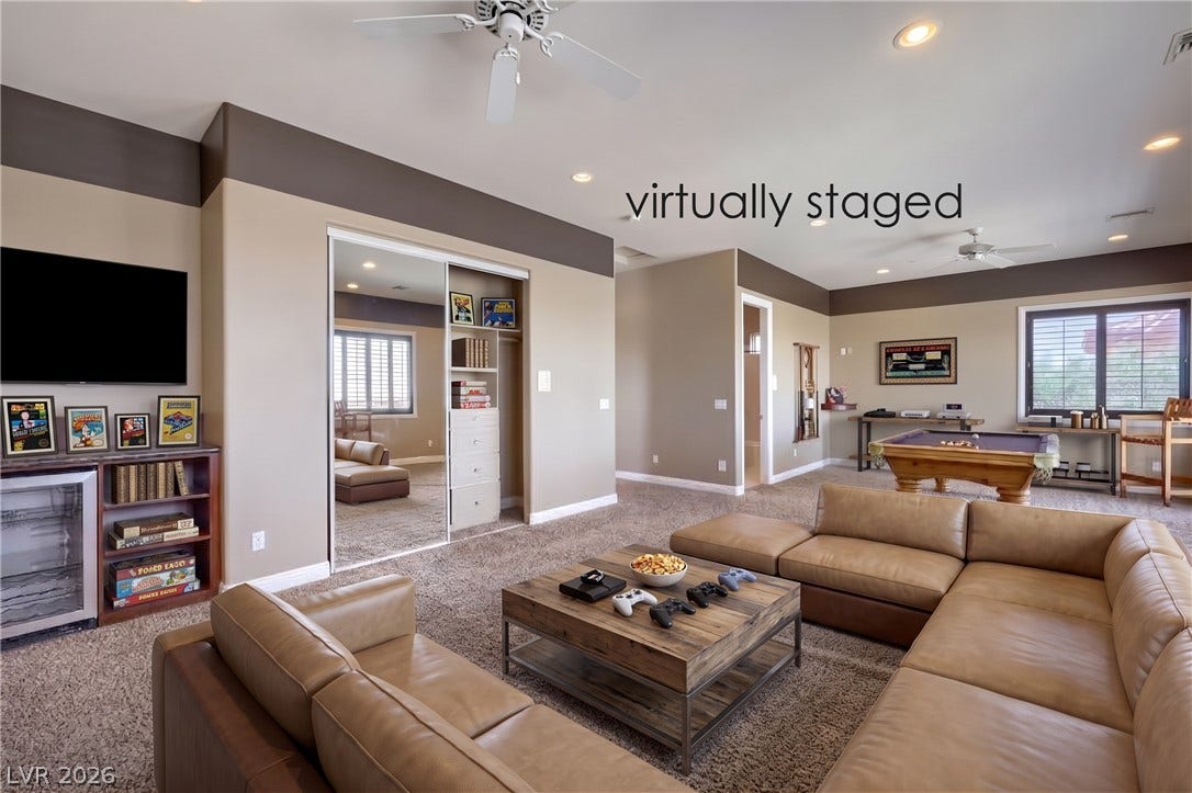 2807 Richmar Avenue, Henderson, NV 89074 Recessed lighting and wall-to-wall carpeting define this versatile second-floor recreation space.