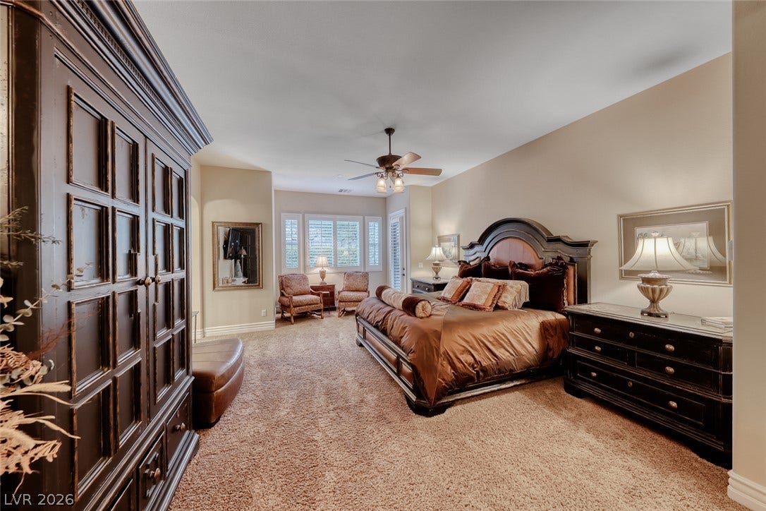 41 Moltrasio Lane, Henderson, NV 89011 High ceilings and plush carpeting anchor this spacious retreat.