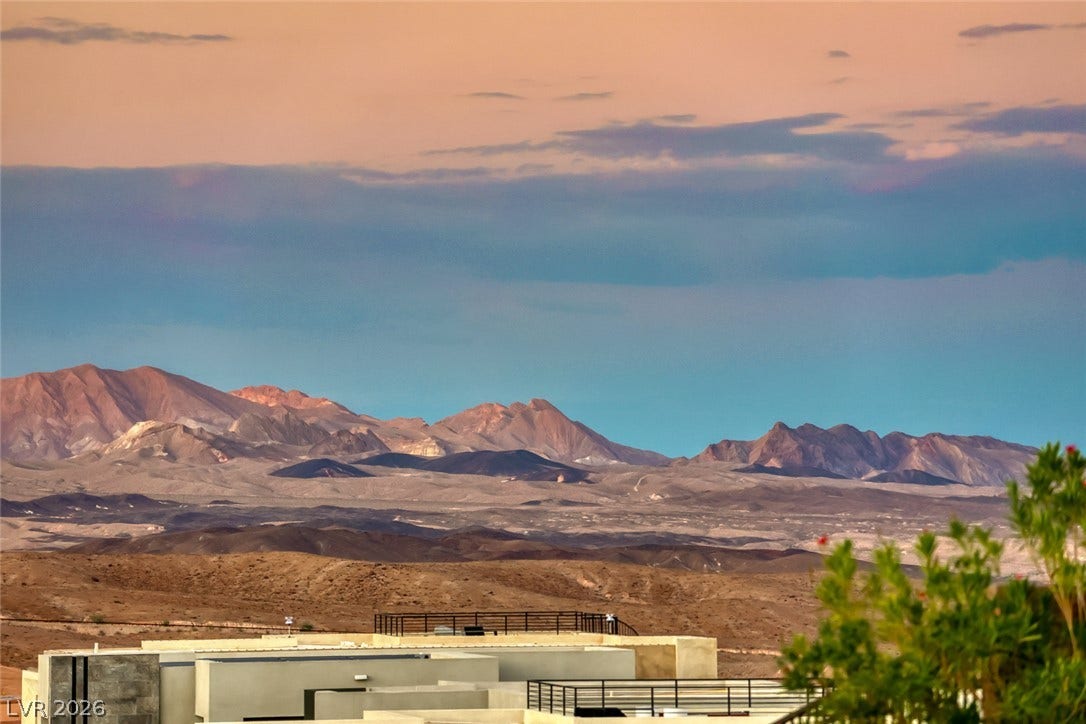 41 Moltrasio Lane, Henderson, NV 89011 Expansive desert horizons and rugged peaks frame this property view.