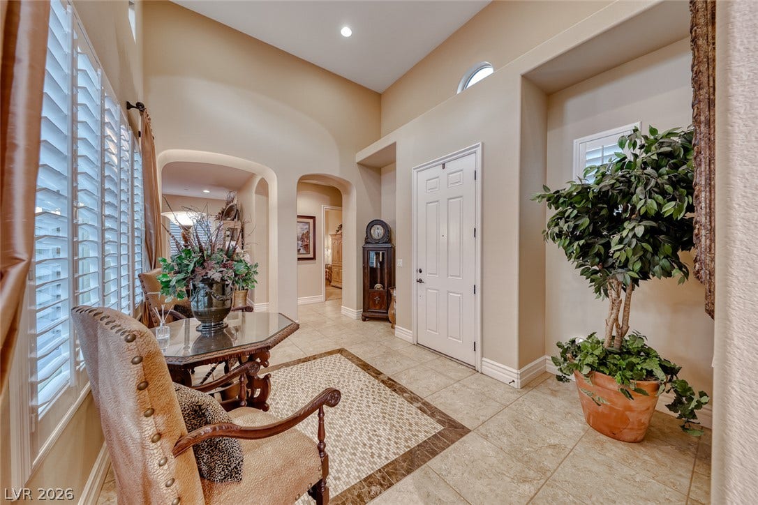 41 Moltrasio Lane, Henderson, NV 89011 High ceilings and tiled flooring create an inviting transition into the main living spaces.