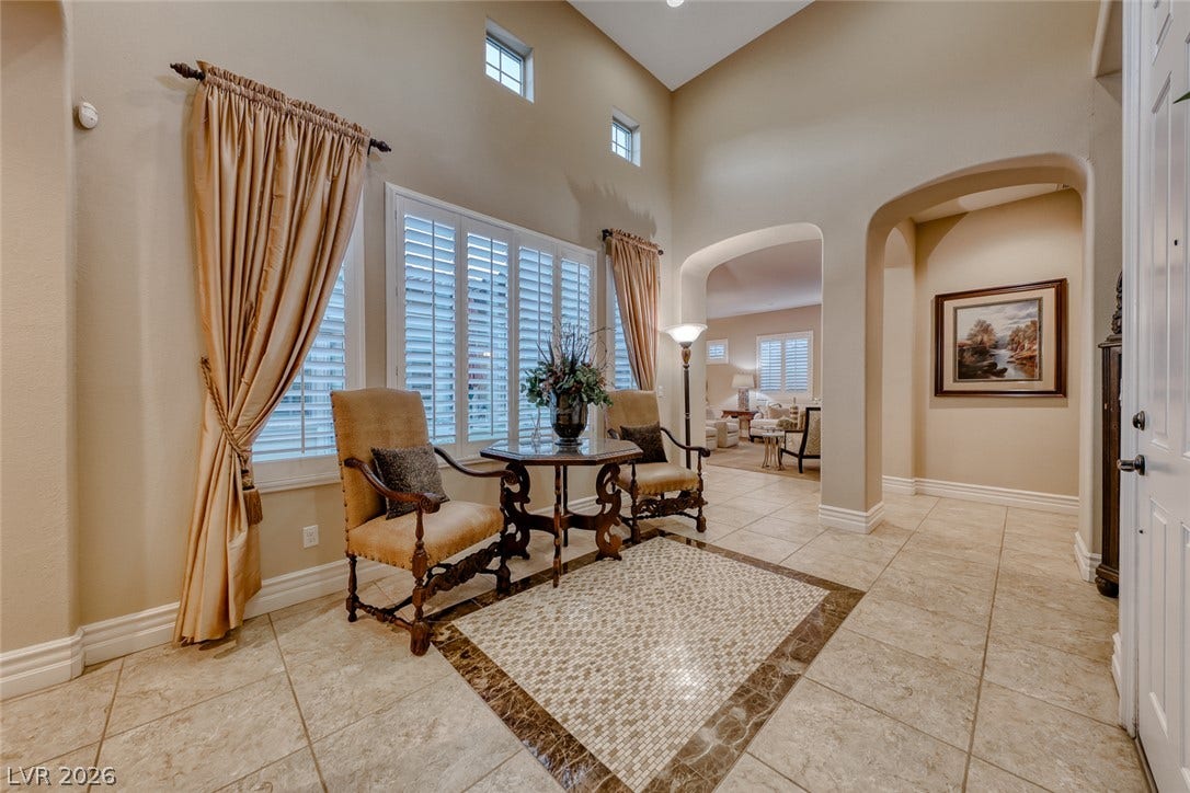 41 Moltrasio Lane, Henderson, NV 89011 High ceilings and inlaid tile flooring create an inviting first impression in this grand entryway.
