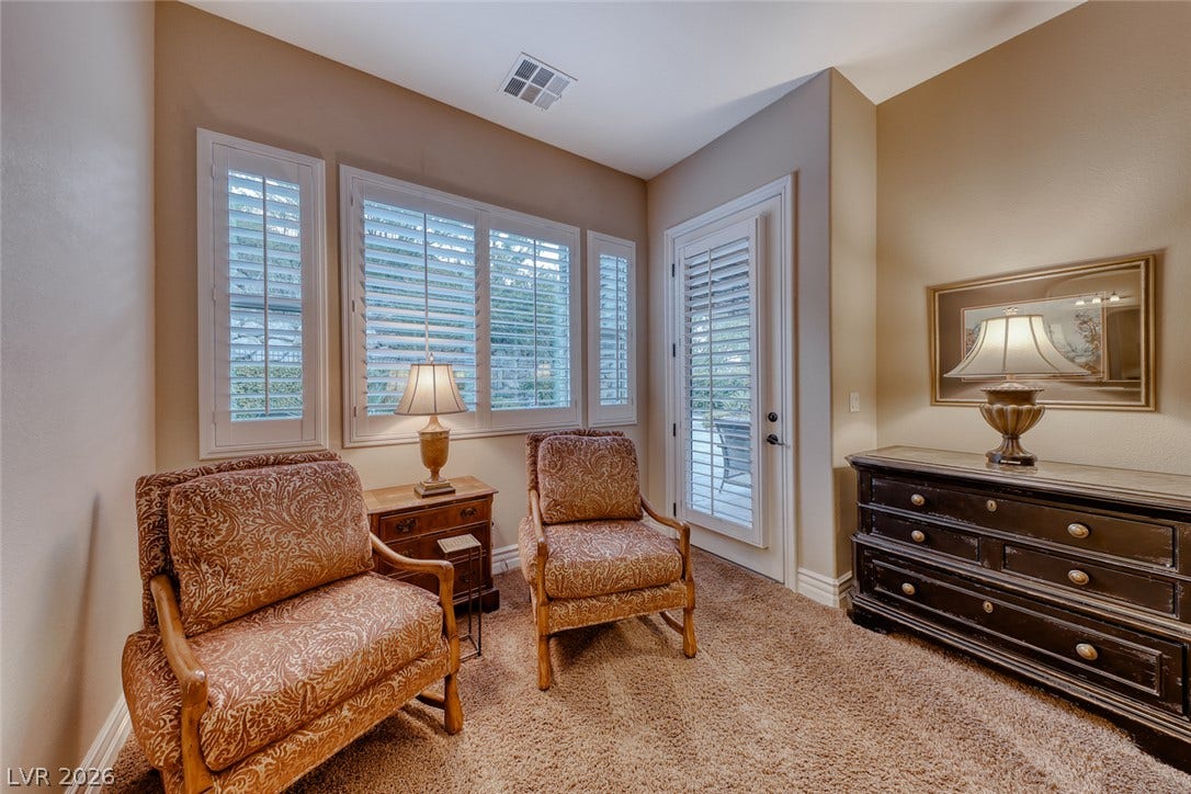 41 Moltrasio Lane, Henderson, NV 89011 Plush carpeting and custom plantation shutters create a warm, inviting atmosphere in this cozy space.