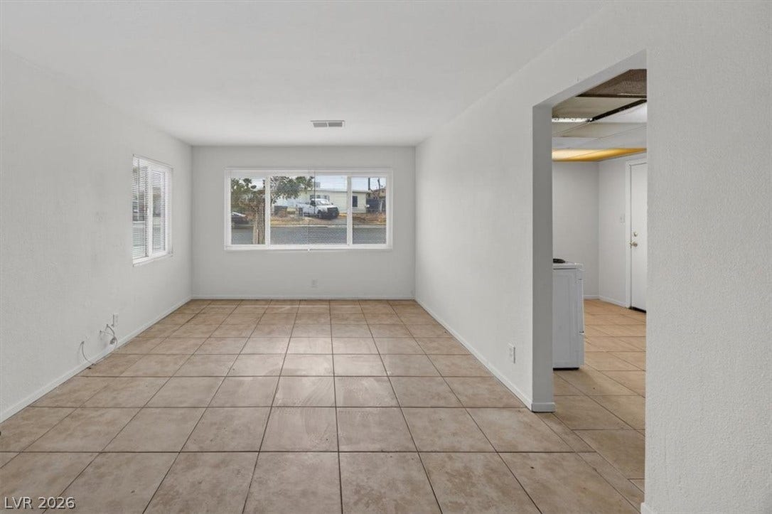 120 W Victory Road, Henderson, NV 89015 Durable tile flooring runs throughout this open interior space filled with natural light.