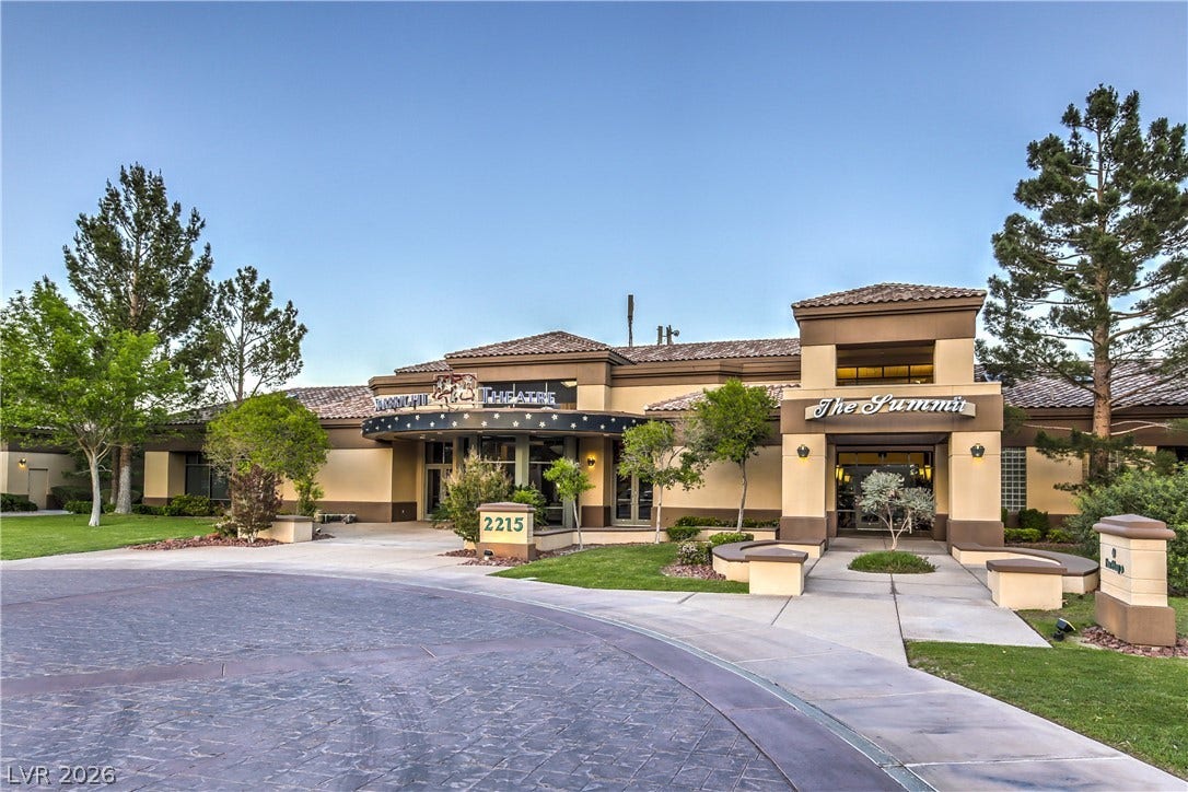 10700 Grand Cypress Avenue, Las Vegas, NV 89134 A spacious driveway sweeps past the well-manicured entryway of this Mediterranean-style clubhouse.