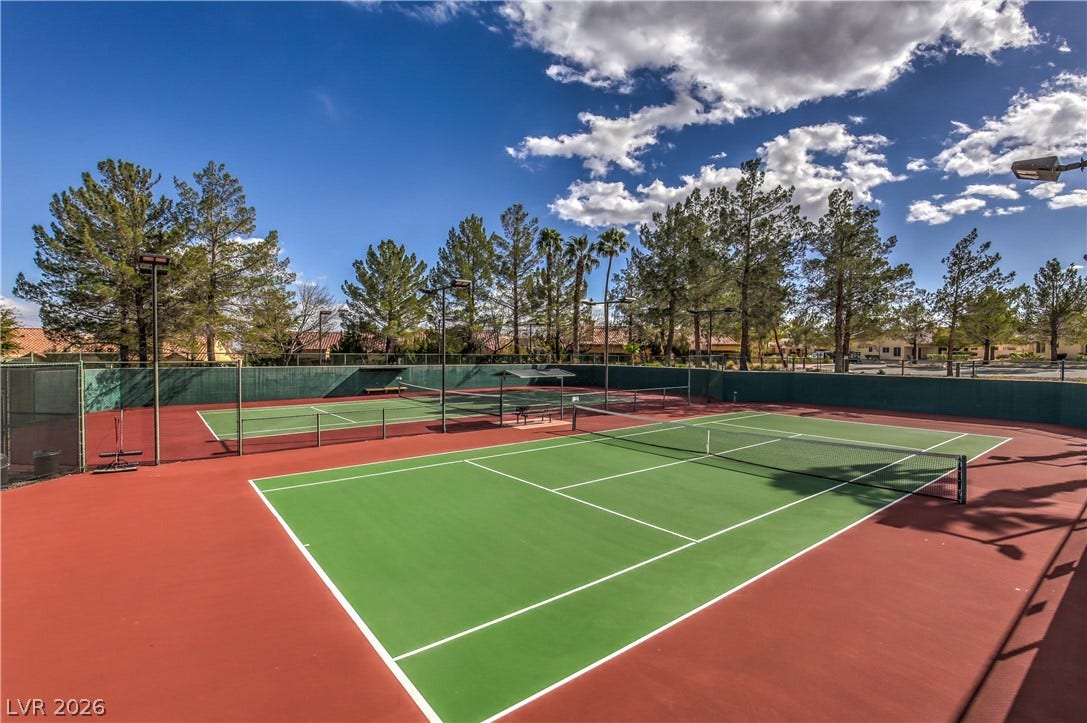 10700 Grand Cypress Avenue, Las Vegas, NV 89134 Professional outdoor courts offer a premier space for recreation and competitive play under open skies.