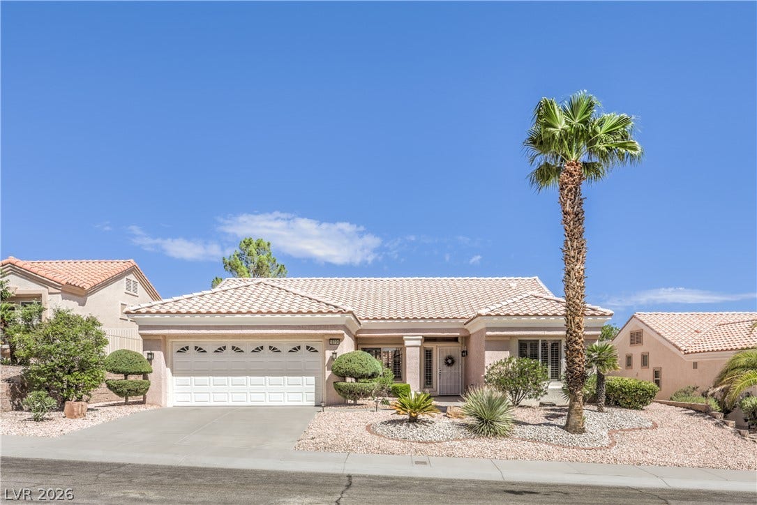 10700 Grand Cypress Avenue, Las Vegas, NV 89134 A classic tile roof and low-maintenance desert landscaping frame this single-level home.