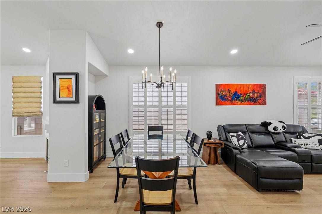 3027 Panorama Ridge Drive, Henderson, NV 89052 Smooth plaster walls and warm Plank flooring define this open, light-filled dining space.