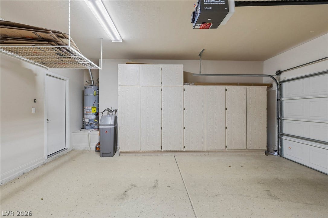 3027 Panorama Ridge Drive, Henderson, NV 89052 Ample built-in cabinetry provides extensive storage options within this functional garage space.