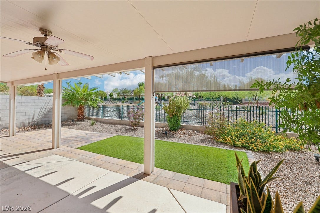 3027 Panorama Ridge Drive, Henderson, NV 89052 A covered back porch offers peaceful views of the landscaped yard and surrounding neighborhood.