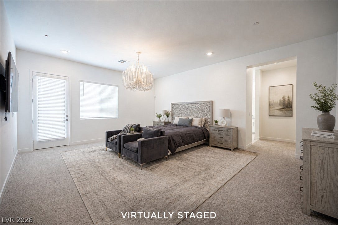 3904 Aiden Creek Avenue, North Las Vegas, NV 89031 Recessed lighting and warm carpet enhance this peaceful retreat with direct outdoor access.