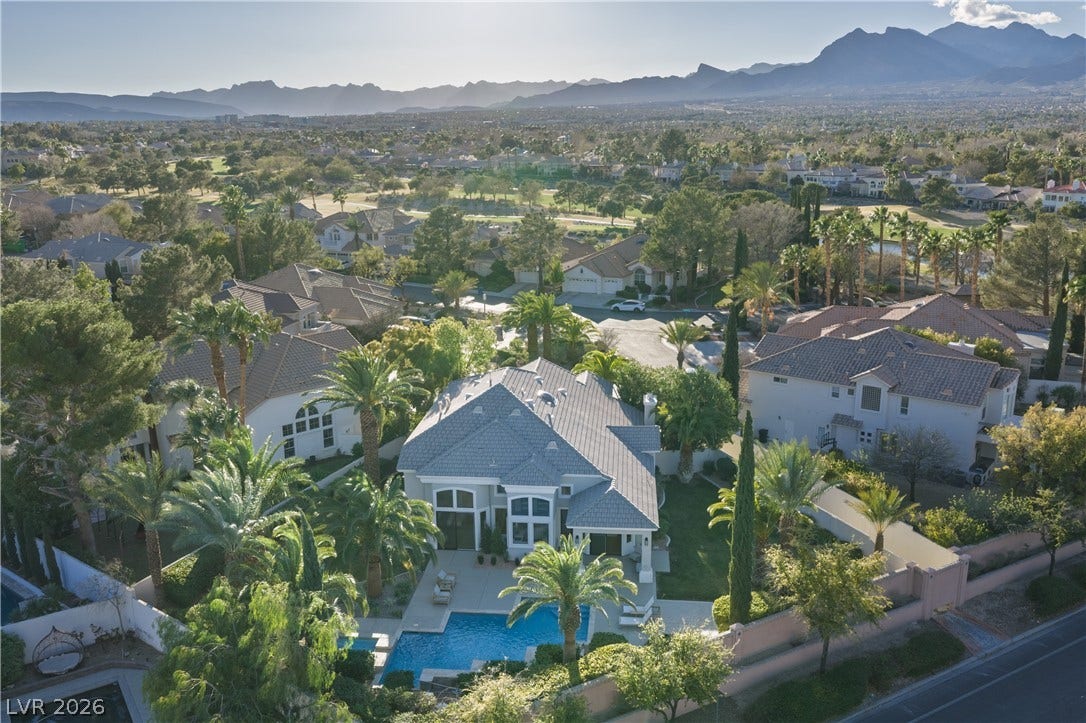 8800 Lusso Court, Las Vegas, NV 89134 Aerial view of residential area featuring a mountainous background