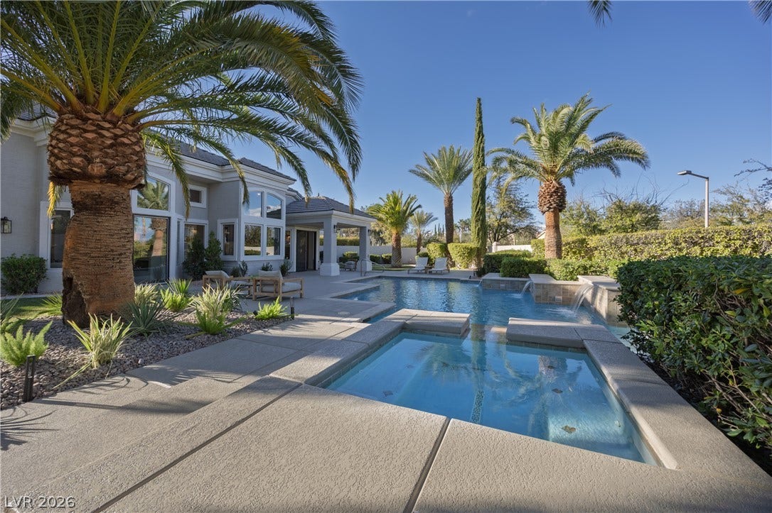 8800 Lusso Court, Las Vegas, NV 89134 Relaxing pool / spa with a patio
