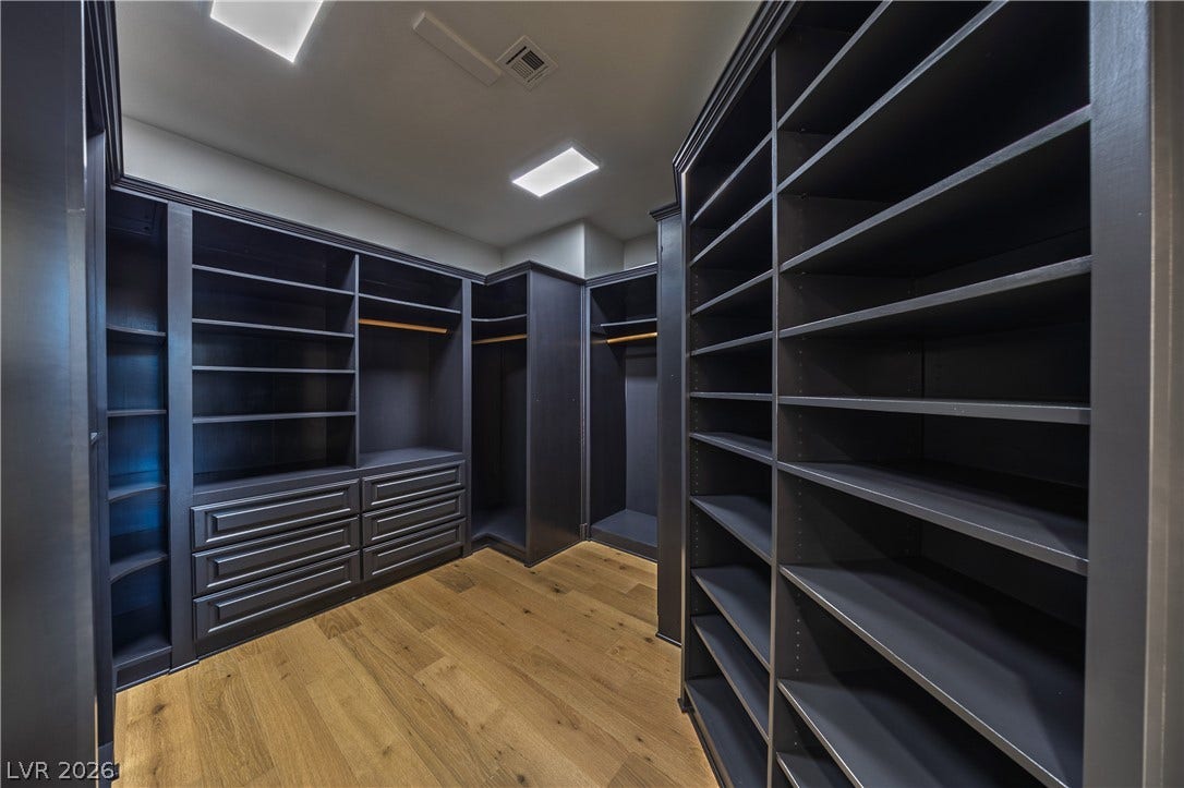 8800 Lusso Court, Las Vegas, NV 89134 Walk in closet featuring light wood finished floors