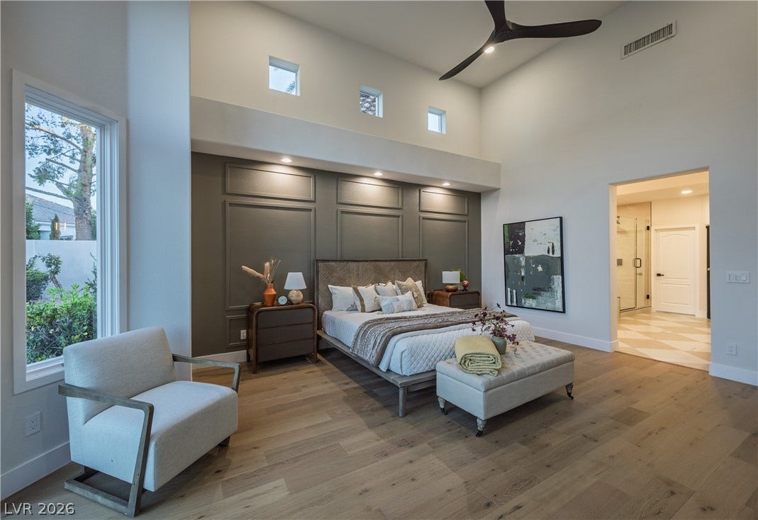 8800 Lusso Court, Las Vegas, NV 89134 Bedroom featuring a high ceiling, light wood-type flooring, ceiling fan, and recessed lighting