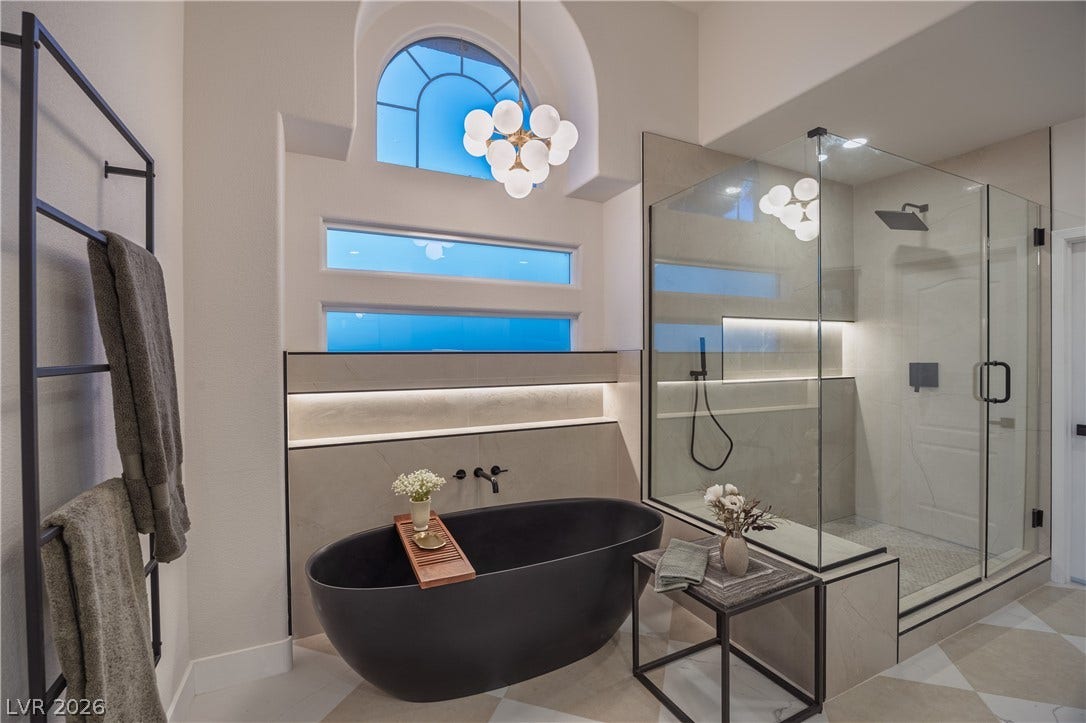 8800 Lusso Court, Las Vegas, NV 89134 Bathroom featuring a freestanding tub and a shower stall
