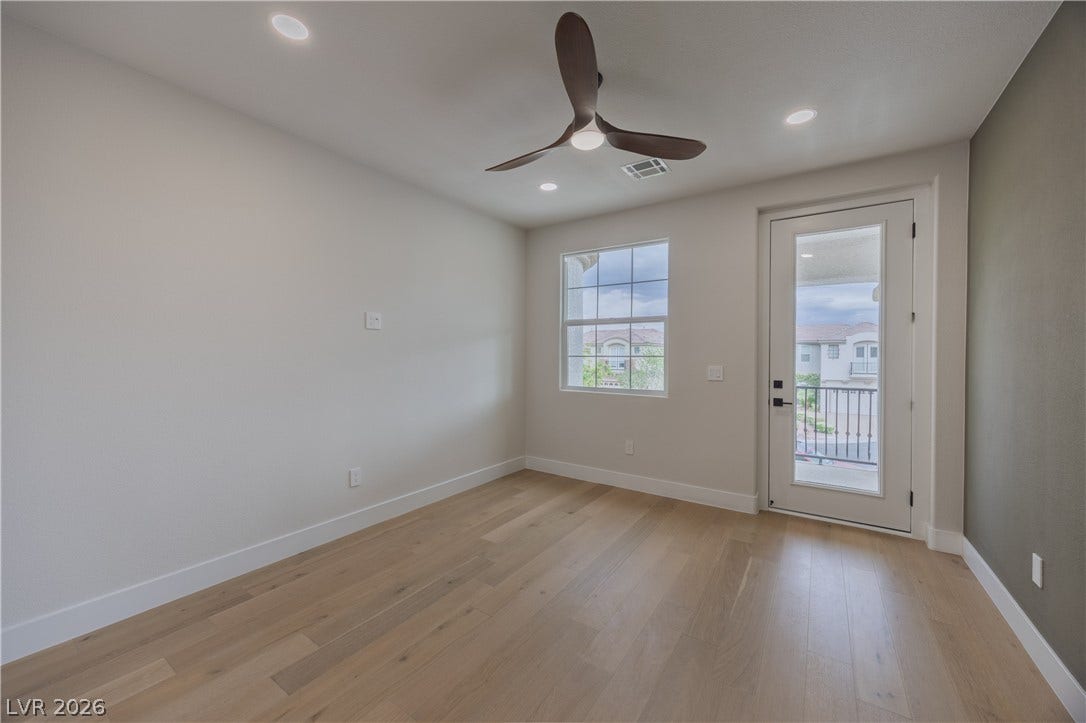 Doorway to outside featuring ceiling fan, hardwood / wood-style flooring, and recessed lighting