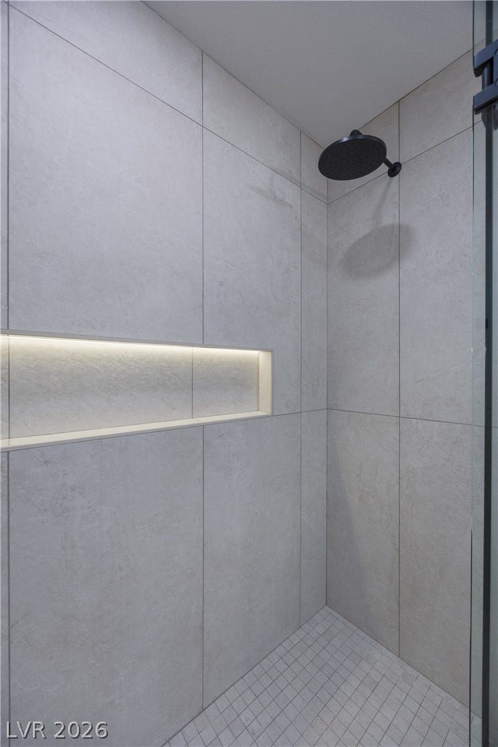 Full bathroom with a stall shower