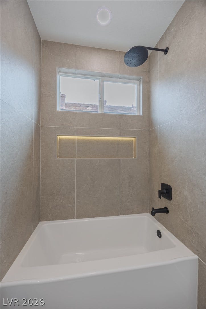 Full bathroom with bathing tub / shower combination
