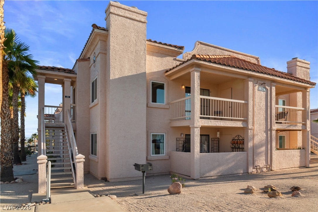 View of building exterior featuring stairs
